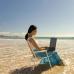 Can an employee work in another position during his vacation?